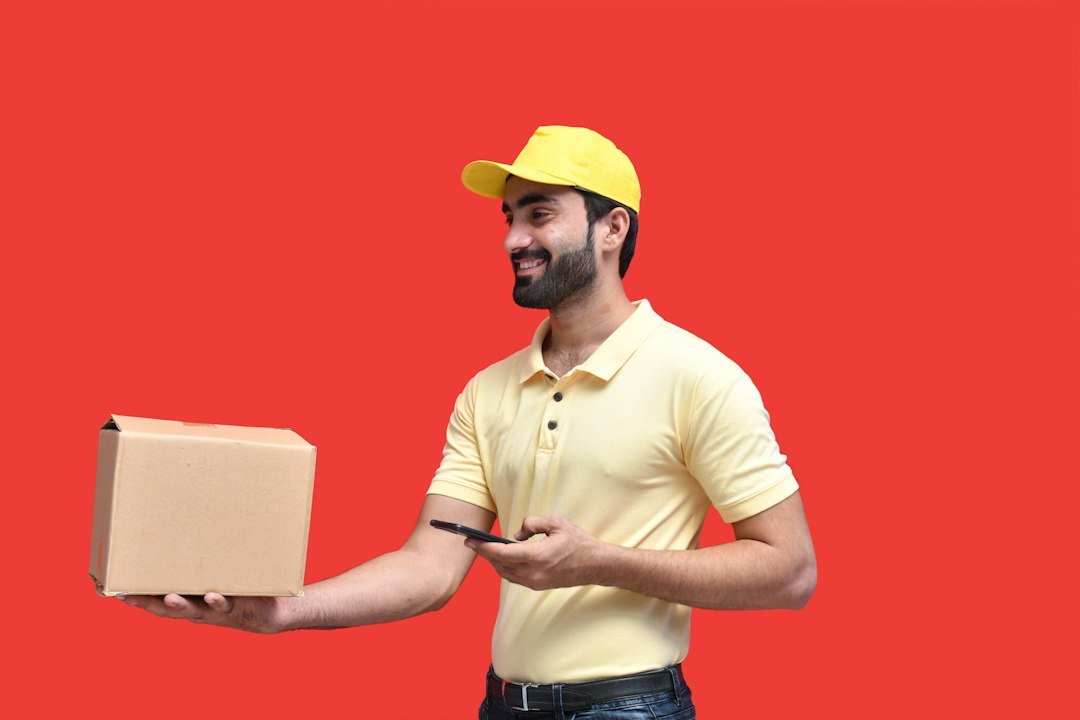 Delivery worker holding a parcel, an illustration of a delivery decision.